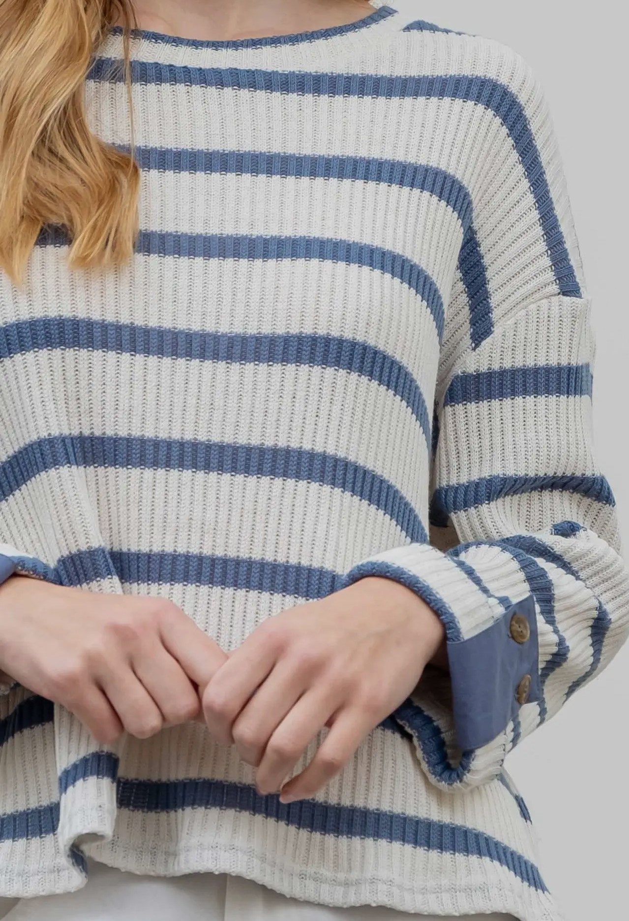 Striped sweater with cuffed sleeves