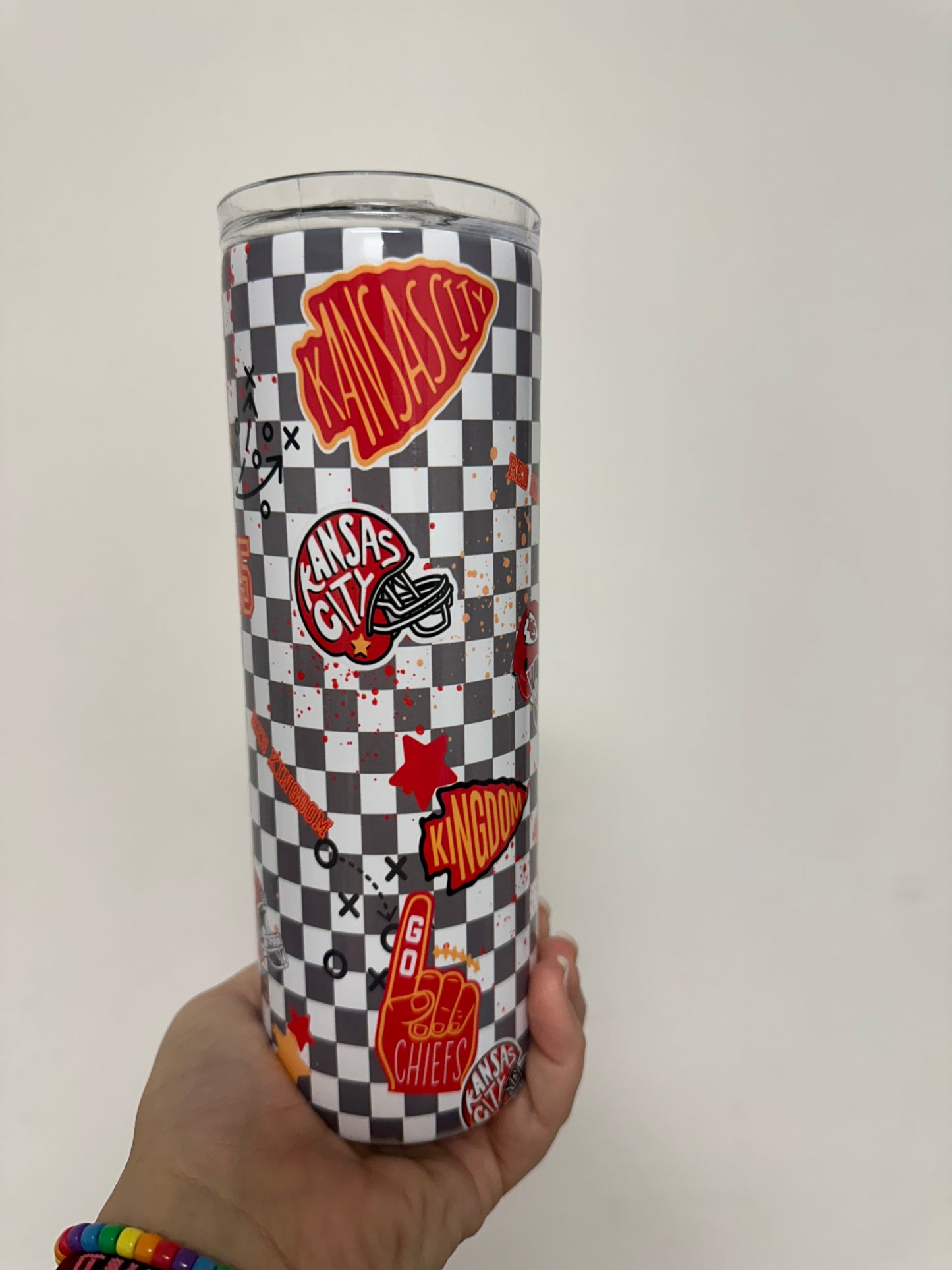 Checkered football tumbler